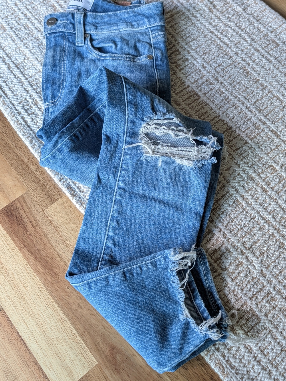 PAIGE Light Blue Distressed Cropped Jeans